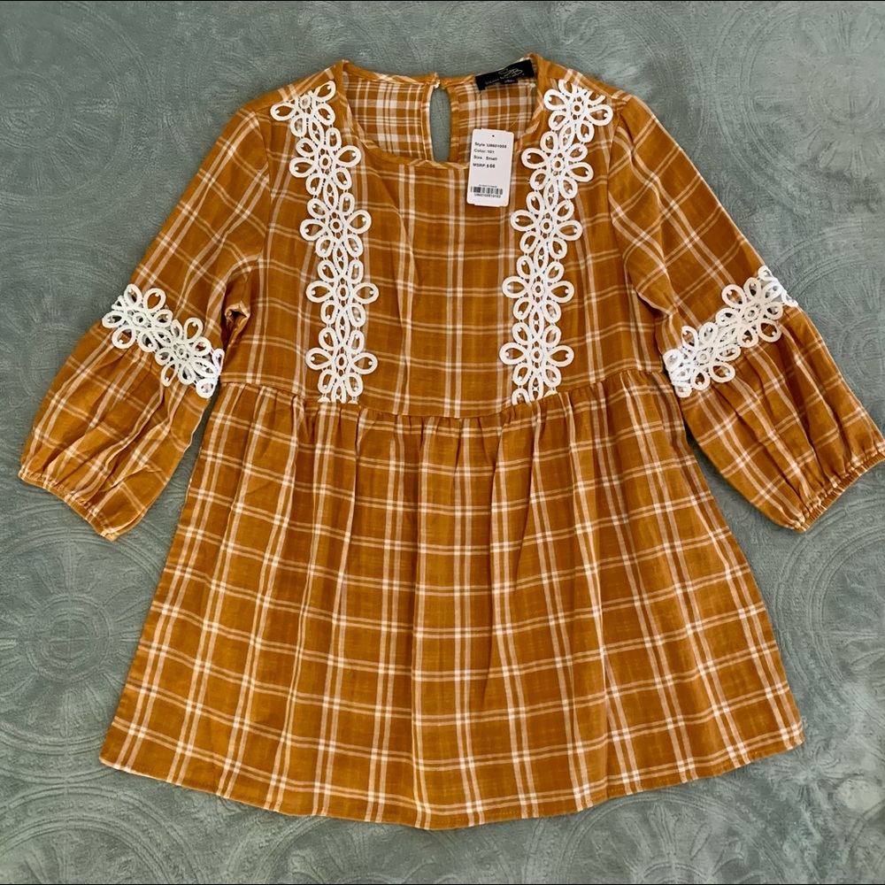 Brand new-Never worn!! Long Sleeve Boutique Top; Size Small; Original price: $66